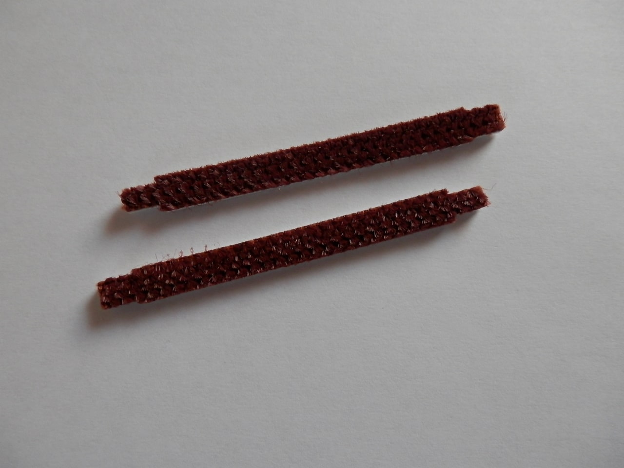 Porszívófejhez szöszemelő